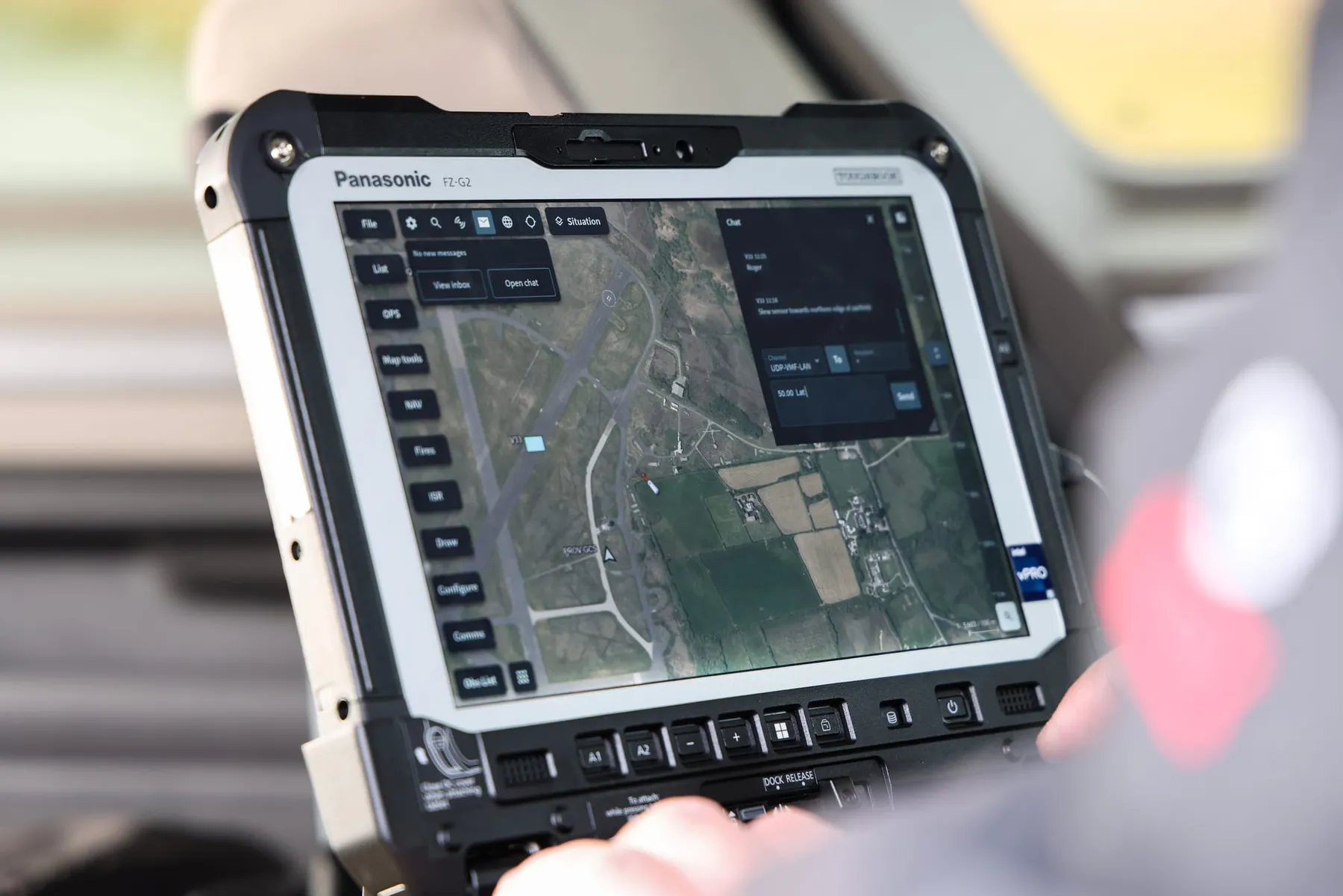 A military computer showing footage of a landscape from a drone